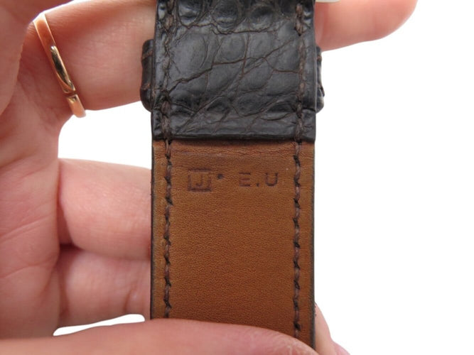 Hermès - Bracelet manchette Boucle Étrivière en cuir de crocodile alligator 58 Facettes 260320