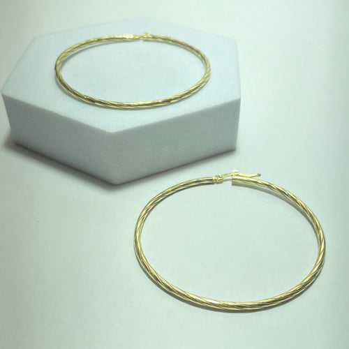Boucles d'oreilles Boucles d'oreilles créoles torsadées en or jaune 18 carats 58 Facettes 250315