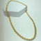 Collier Collier maille texturée en or jaune 18K 58 Facettes 250128