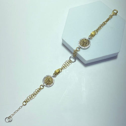 Bracelet Bracelet - Bracelet avec médaillons décoratifs en or jaune 58 Facettes 250297