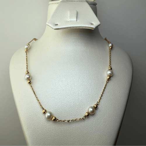 Collier Collier en chaîne avec perles en or jaune 58 Facettes 250016