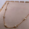 Collier Collier en chaîne avec perles en or jaune 58 Facettes 250016
