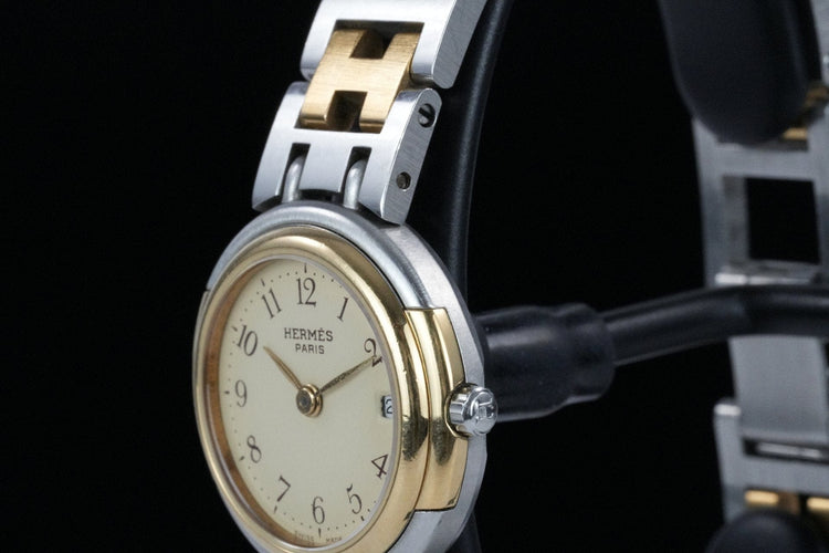 Hermès Windsor - Montre en acier et plaqué or 58 Facettes TOT-01810