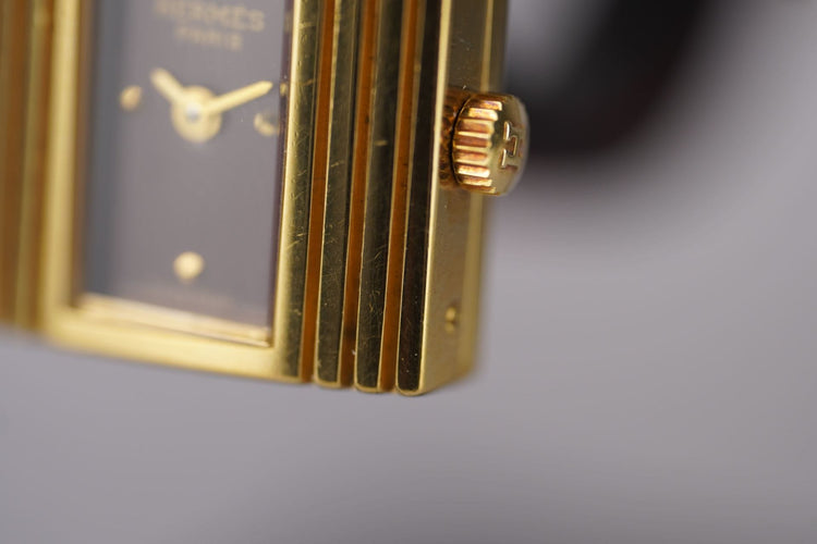 Hermès Kelly - Montre plaqué or sur cuir bordeaux 58 Facettes TOT-11128
