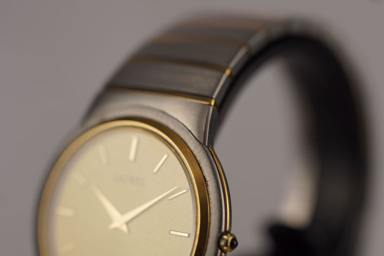 Seiko Laurel - Montre unisexe acier et or jaune 58 Facettes TOT-10679
