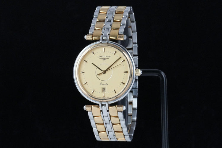 Montre Longines Flagship - Montre unisexe en acier bicolore 58 Facettes TOT-01814