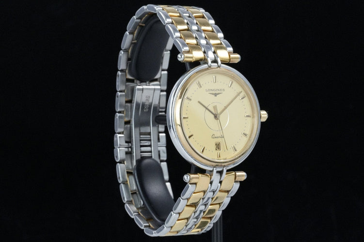 Montre Longines Flagship - Montre unisexe en acier bicolore 58 Facettes TOT-01814