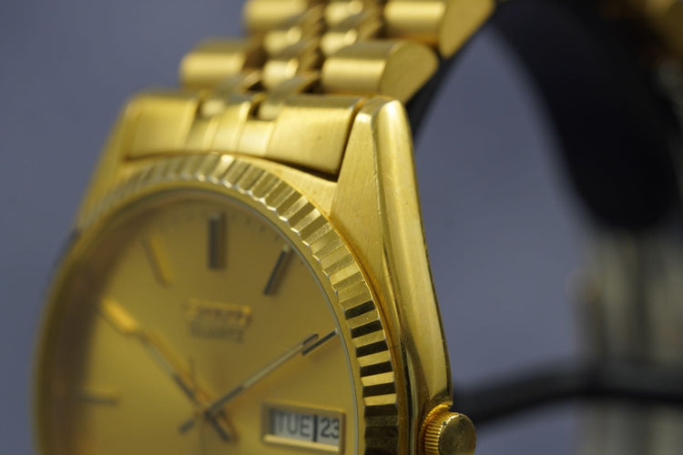 Seiko Quartz SQ - Montre Day Date en acier 58 Facettes TOT-11182
