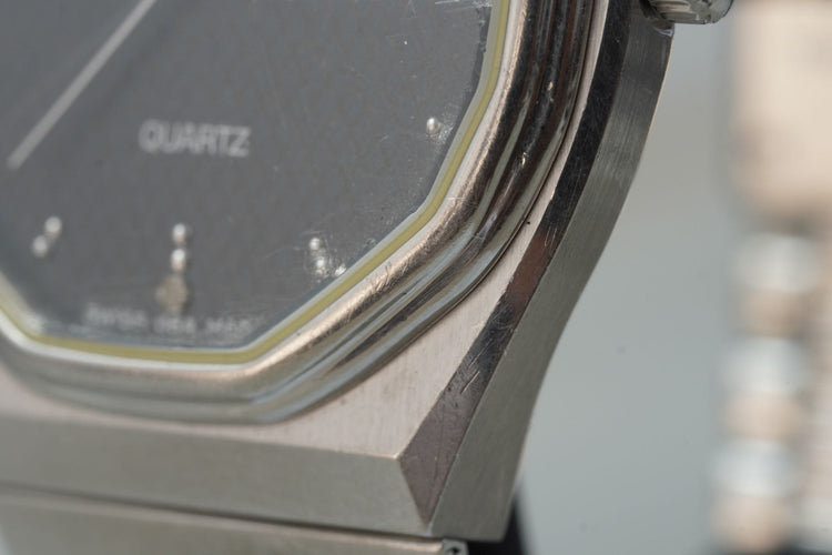 Montre Rado Quartz Day Date - Montre unisexe en acier 58 Facettes TOT-11208