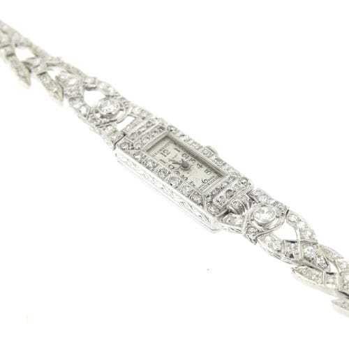 Montre Marvin - Montre de soirée Art déco en or blanc 18 ct et diamants 58 Facettes 14538