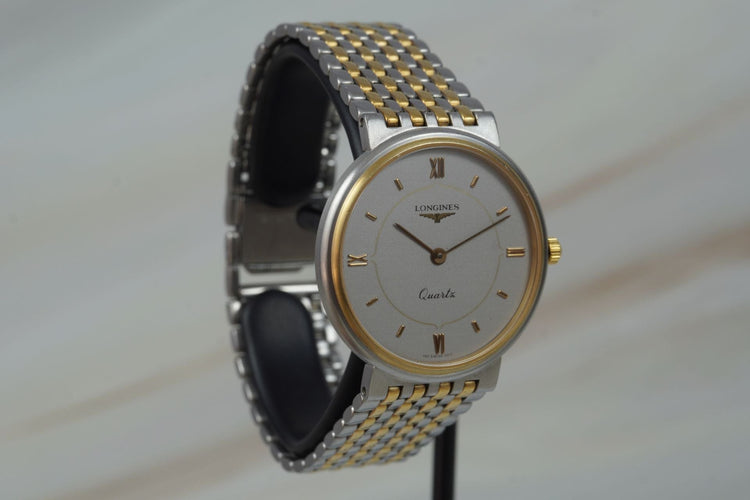 Longines Quartz - Montre unisexe en acier bicolore 58 Facettes TOT-11210