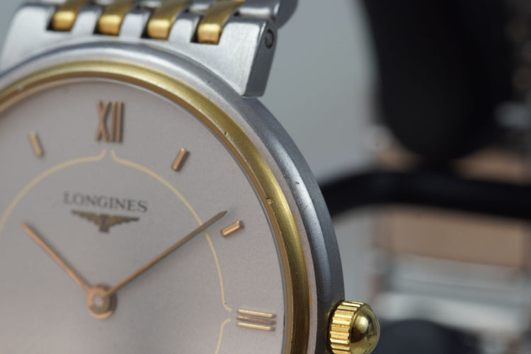 Longines Quartz - Montre unisexe en acier bicolore 58 Facettes TOT-11210