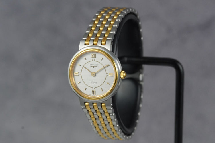 Longines Quartz - Montre femme en acier bicolore 58 Facettes TOT-11253