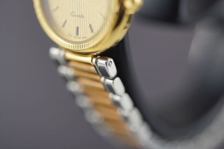 Longines Quartz - Montre en acier bicolore 58 Facettes TOT-10744