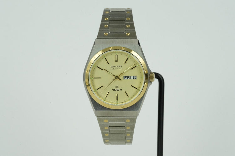 Orient Quartz - Montre unisexe en acier 58 Facettes TOT-01596