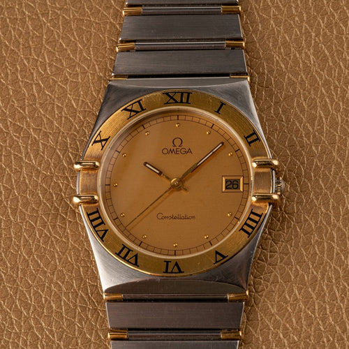 Omega Constellation - Montre quartz en or et acier 58 Facettes TOT-02214