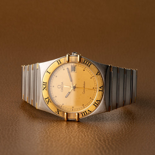 Omega Constellation - Montre quartz en or et acier 58 Facettes TOT-02214