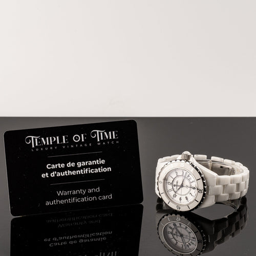 Montre Chanel J12 Limited Edition - Montre en céramique blanche 58 Facettes TOT-02234