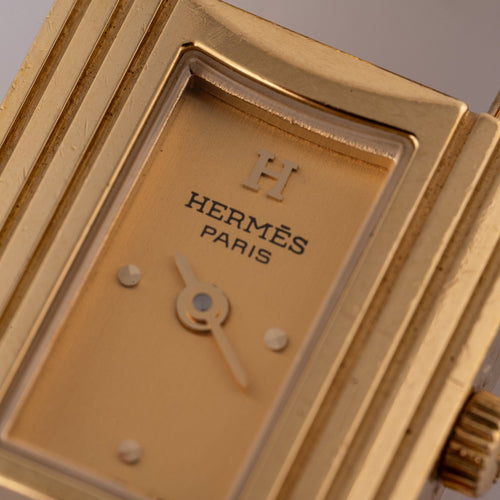 Hermès Kelly - Montre plaqué or cuir vert 58 Facettes TOT-02370