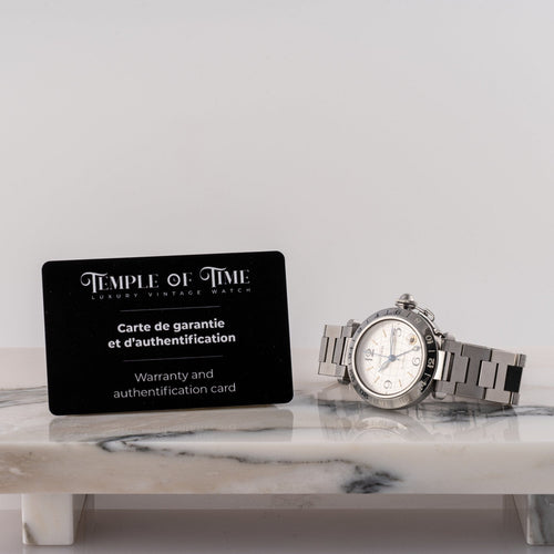 Cartier Pasha GMT - Montre en acier 58 Facettes TOT-02314