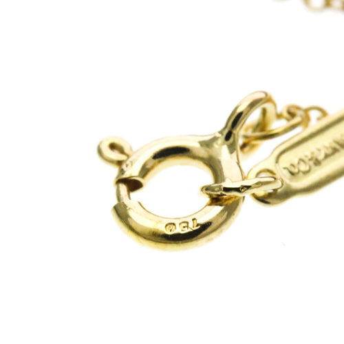 Tiffany & Co. - Pendentif croix en or jaune 18K et diamant 58 Facettes d5ynktsadv