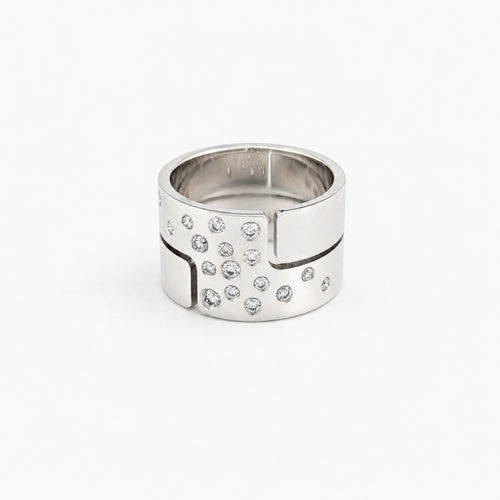 https://18carats.fr/wp-content/uploads/2026/06/37781-37783-Bague-Dinh-Van-Seventies-en-or-blanc-et-diamant.jpg
