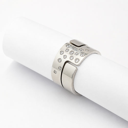https://18carats.fr/wp-content/uploads/2026/06/37781-37782-Bague-Dinh-Van-en-or-blanc-et-diamant.jpg