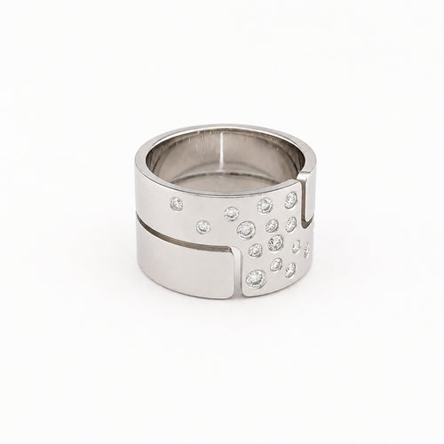 https://18carats.fr/wp-content/uploads/2026/06/37781-37784-Bague-Dinh-Van-Seventies-en-or-blanc-et-diamant.jpg