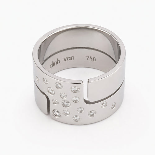 https://18carats.fr/wp-content/uploads/2026/06/37781-37786-Bague-Dinh-Van-Seventies-en-or-blanc-et-diamant.jpg