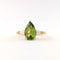 https://18carats.fr/wp-content/uploads/2026/06/37775-37804-Bague-en-or-jaune-peridot-taille-poire-et-deux-diamants-tappers.jpg