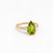 https://18carats.fr/wp-content/uploads/2026/06/37775-37780-Bague-en-or-jaune-peridot-taille-poire-et-deux-diamants-tappers.jpg