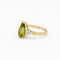 https://18carats.fr/wp-content/uploads/2026/06/37775-37777-Bague-en-or-jaune-peridot-taille-poire-et-deux-diamants-tappers.jpg
