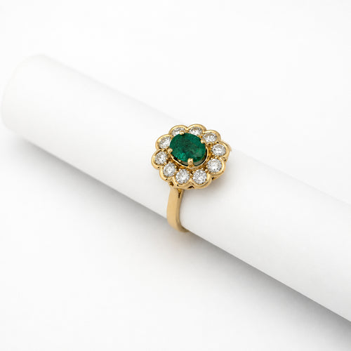 https://18carats.fr/wp-content/uploads/2026/06/37626-37764-Bague-marguerite-en-or-jaune-emeraude-et-diamants.jpg