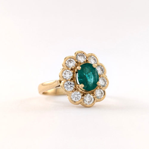 https://18carats.fr/wp-content/uploads/2026/06/37626-37807-Bague-marguerite-en-or-jaune-emeraude-et-diamants.jpg