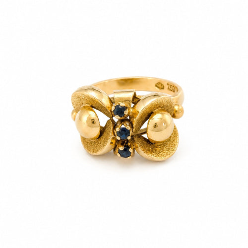 https://18carats.fr/wp-content/uploads/2026/06/37712-37714-Bague-art-nouveau-en-or-jaune-sertie-de-saphirs.jpg