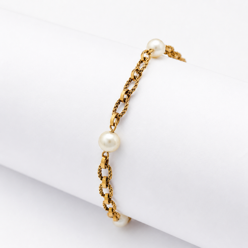 https://18carats.fr/wp-content/uploads/2026/05/36974-36975-Bracelet-en-or-jaune-et-perle.png