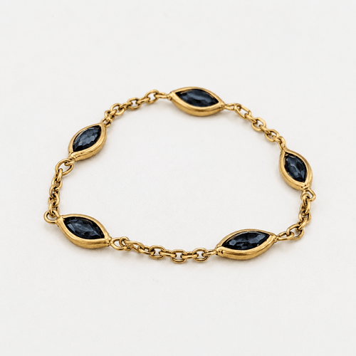 https://18carats.fr/wp-content/uploads/2026/05/36797-36842-Bague-en-or-jaune-et-saphir.png