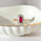 55.5 Bague entourage ancienne en or rose avec rubis et diamants taille ancienne 58 Facettes HJ062642