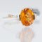 57 Bague suisse en or blanc avec topaze dorée et diamants 58 Facettes A1571