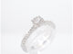 53 Bague halo en or blanc et diamants 58 Facettes 1003