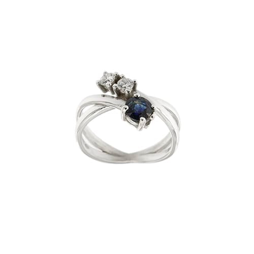 Bague Bague contrariée en or blanc 18 ct avec saphir et diamants 58 Facettes 34539