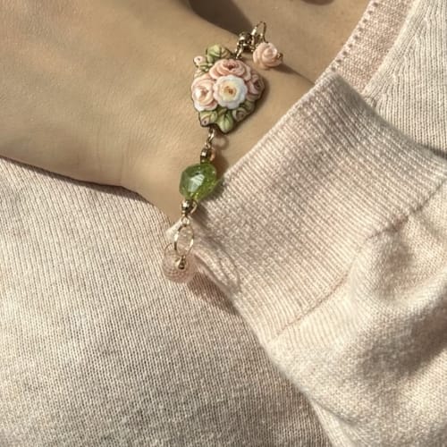 Bracelet Gabriella Rivalta - Bracelet à maillons en or jaune avec fleur émaillée 58 Facettes 36316