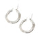 Boucles d'oreilles Boucles d’oreilles créoles ondulées en or blanc 18 ct 58 Facettes 22479