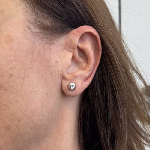 Boucles d'oreilles Boucles d’oreilles point de lumière en or blanc 18 ct et diamants 0,16 ct 58 Facettes 37342