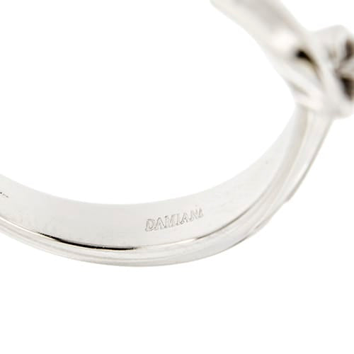 Bague Damiani - Bague solitaire contrariée en or blanc 18 ct avec diamant 0,13 ct 58 Facettes 37094