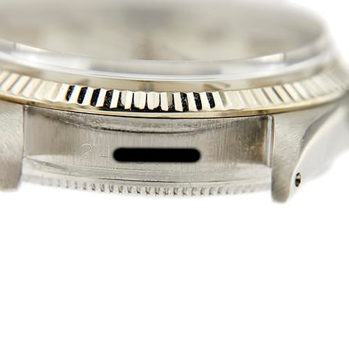 Montre Rolex Oyster Perpetual - Montre en acier, lunette cannelée en or blanc 58 Facettes 36869