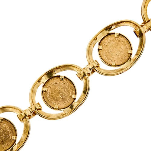 Bracelet Bracelet vintage émaillé à pièces Dos Pesos en or jaune 18 ct 58 Facettes 36092