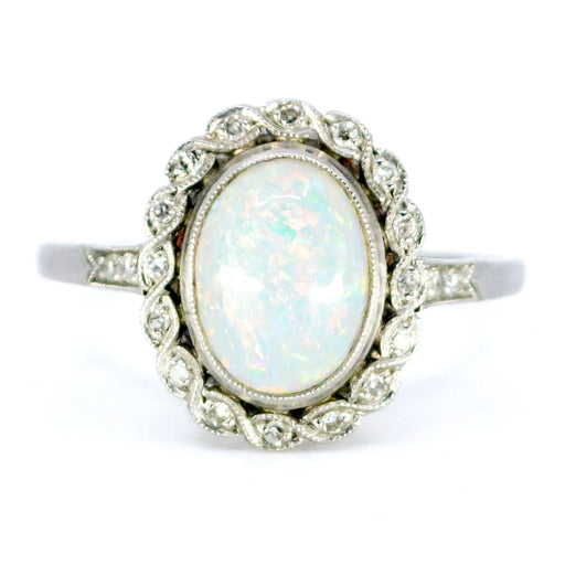 Bague 54 Bague ovale en platine avec opale et diamants 58 Facettes 39E179AC58BE488FB4B864718383155A