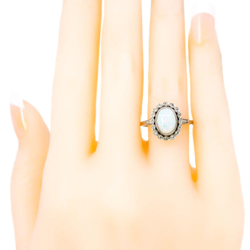 Bague 54 Bague ovale en platine avec opale et diamants 58 Facettes 39E179AC58BE488FB4B864718383155A