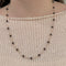 Collier Collier en or jaune 750 et grenats 58 Facettes Z15B51717